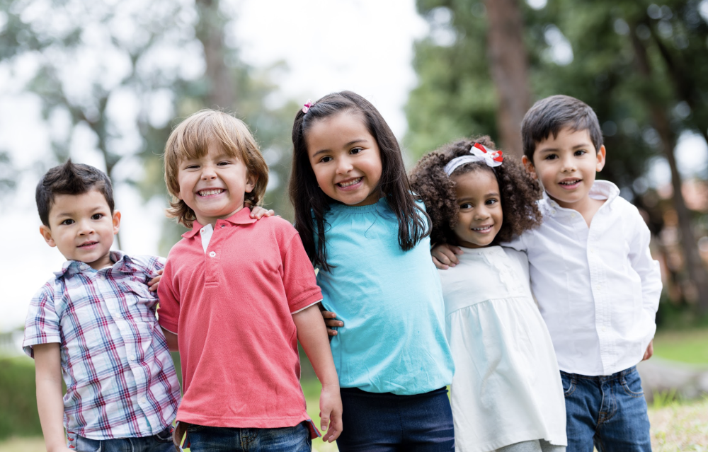 group of five kids outside | pediatric dentist dumbo