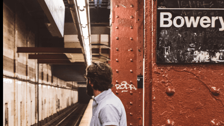 man in nyc subway | brooklyn dentist