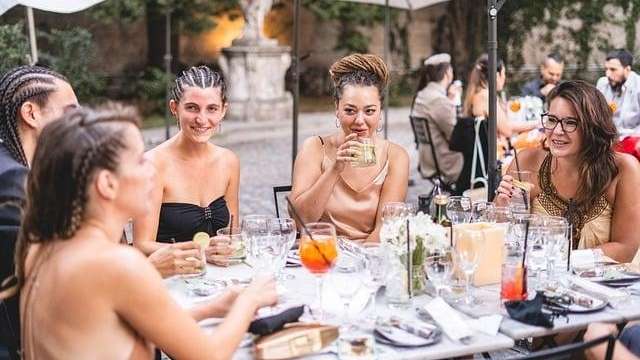 group of women eating lunch | dental bonding brooklyn